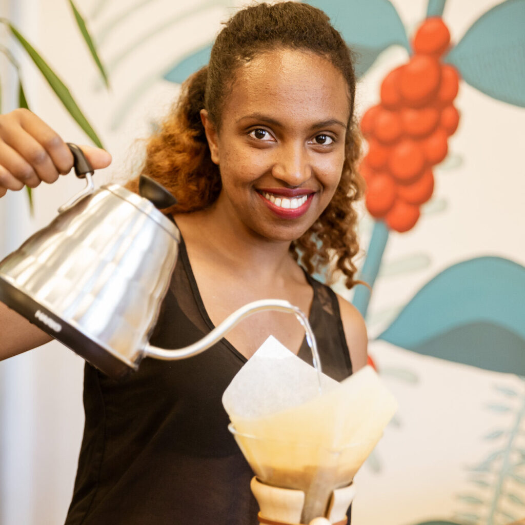 Lady is brewing Chemex