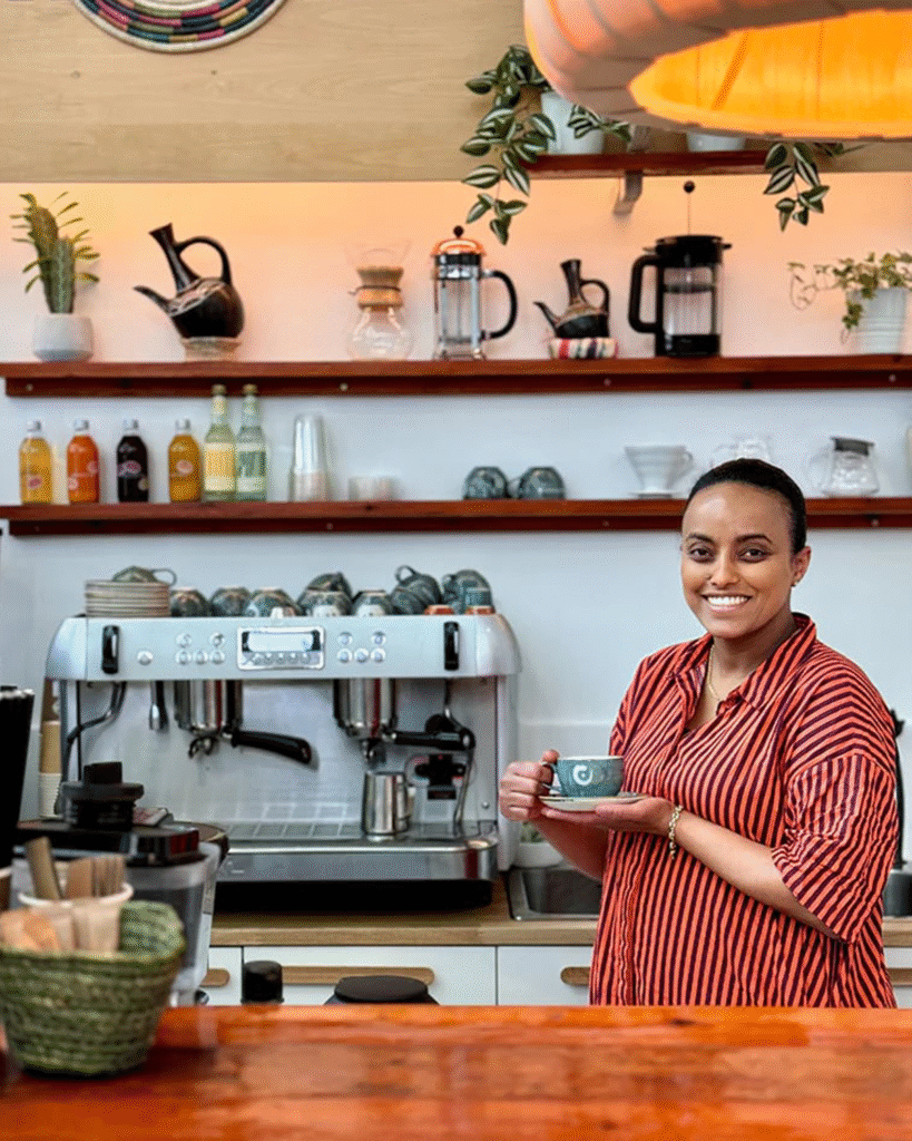 Winta in front of the bar