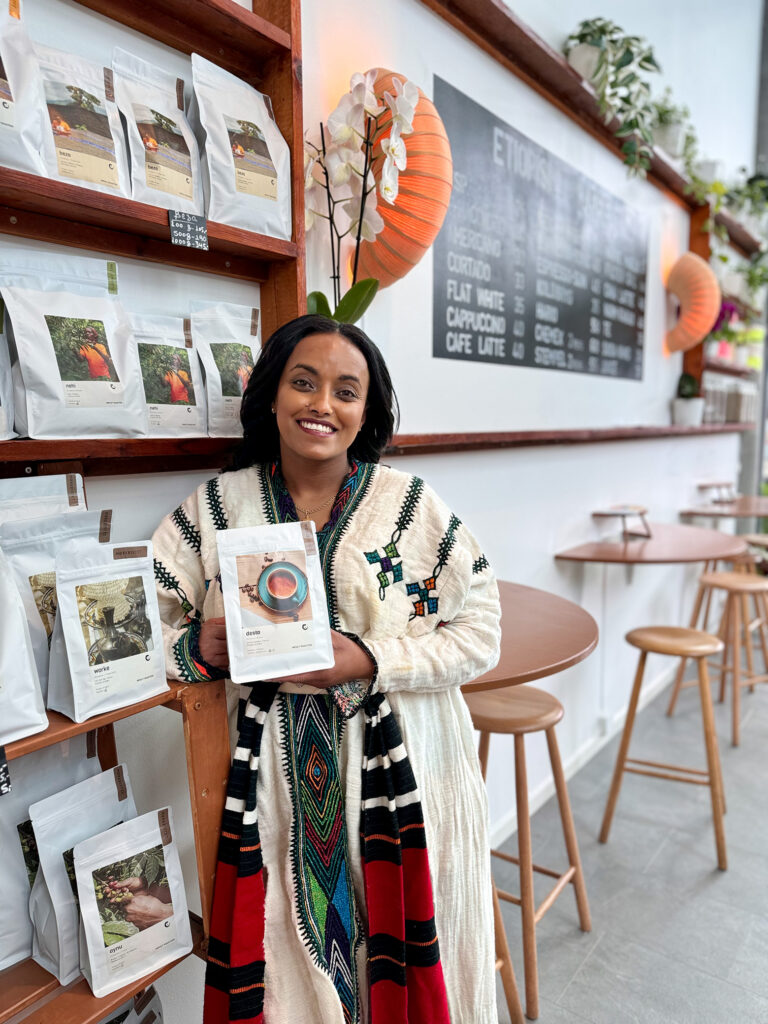 Winta in the Café with coffee beans